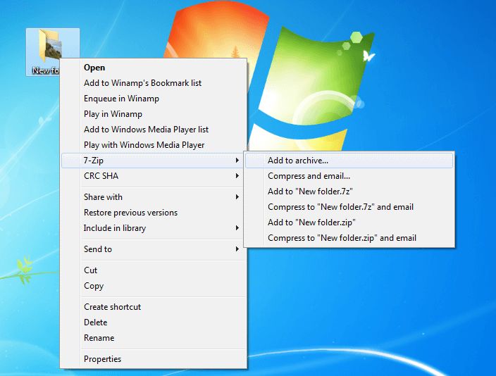 Bureau Windows sur lequel un dossier est ajouté à une archive via « 7-Zip » dans le menu contextuel