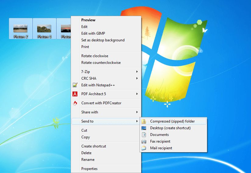 Capture d’écran du bureau Windows où plusieurs fichiers sont envoyés dans un dossier compressé ZIP via le menu contextuel.