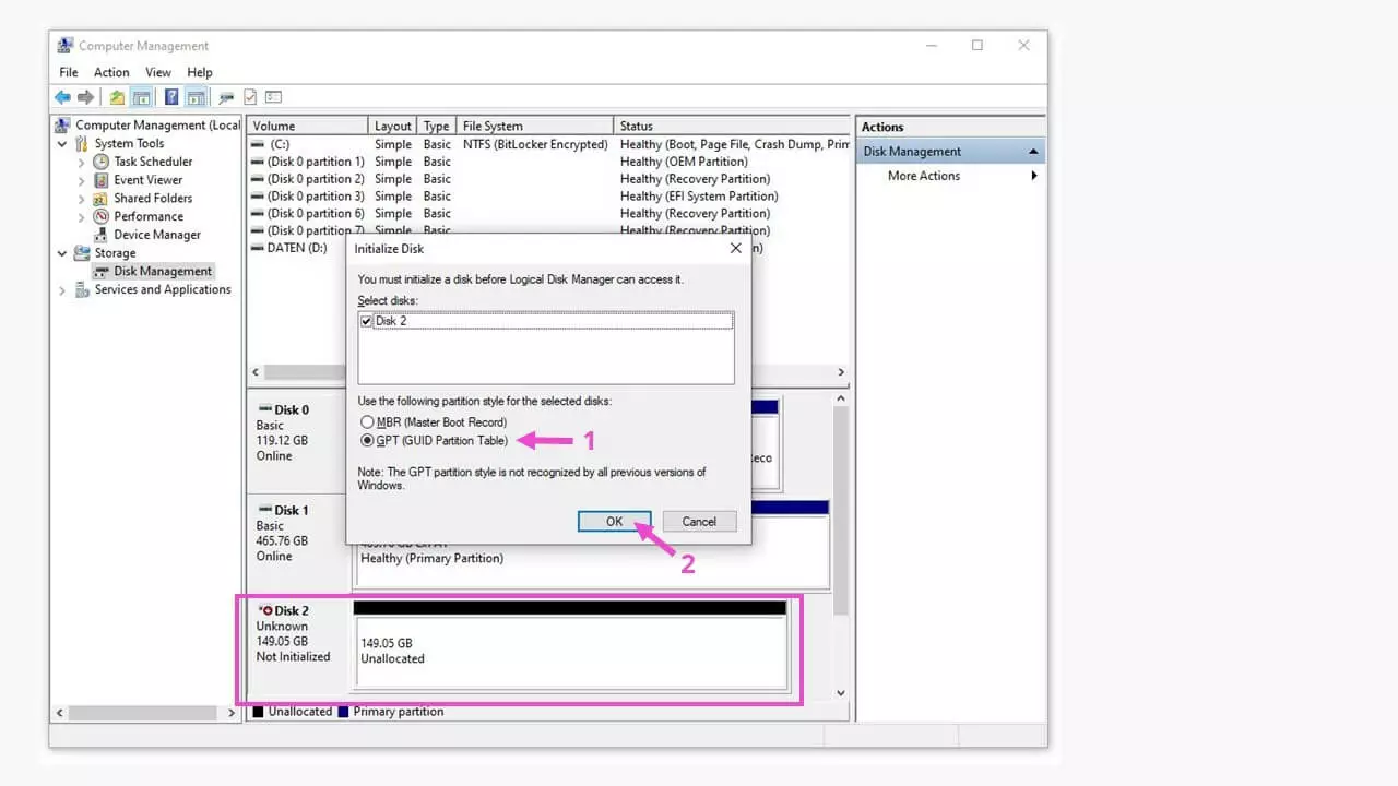 Image: Dans l’initialisation du disque, laissez le style de partition préparamétré sur GPT (1) et validez avec « OK » (2).