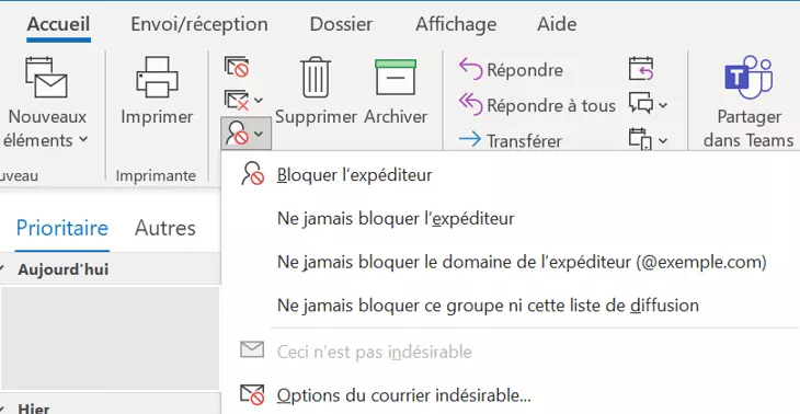 Image: « Courrier indésirable » dans le ruban Outlook